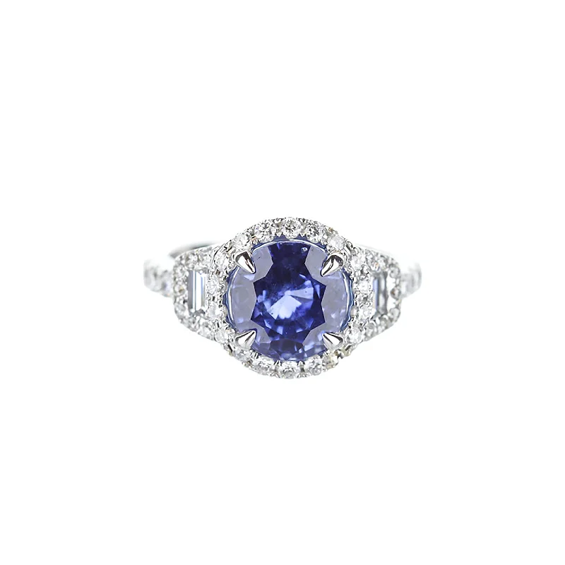 18K White Gold Round Blue Sapphire Engagement Ring With Trapezoid-Cut Diamond Accents And Diamond Halo