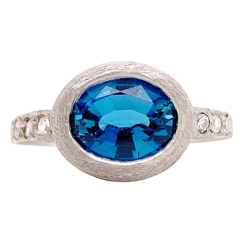 hammered gold disc necklace Royal Blue Topaz Bezel Ring