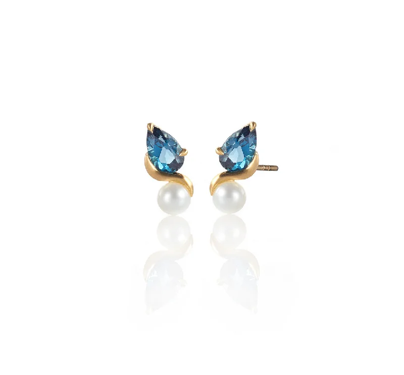 unique gemstone cocktail ring Pearl and London Blue Topaz stud earrings
