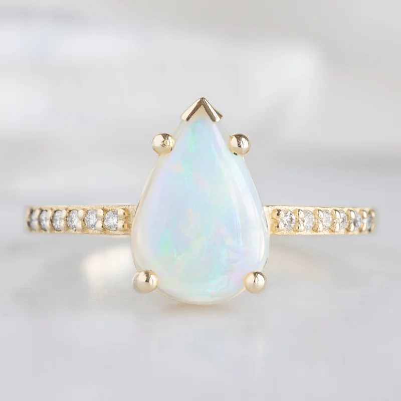 infinity knot wedding band The Willow Ring | 1.15ct Pear Opal in 14K Yellow Gold